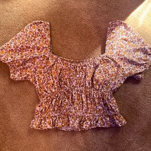 This is a floral print shirt extra small shirt made India